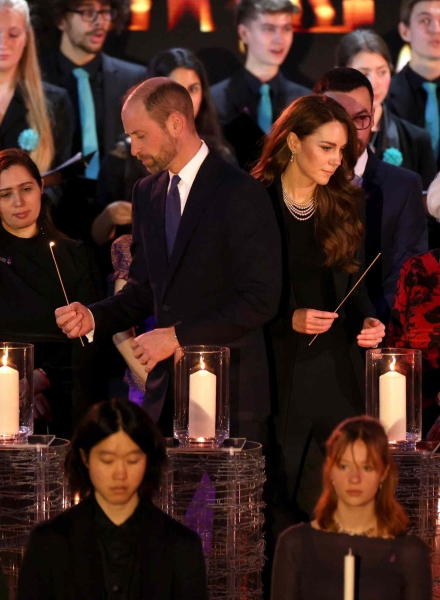 Kate Middleton wore Queen Elizabeth's statement pearl earrings and five-string pearl necklace from a Jewish-owned vintage store with a meaningful message to her last-minute Holocaust Memorial appearance on January 27 alongside Prince William. Here's the hidden meaning behind her jewelry and outfit.