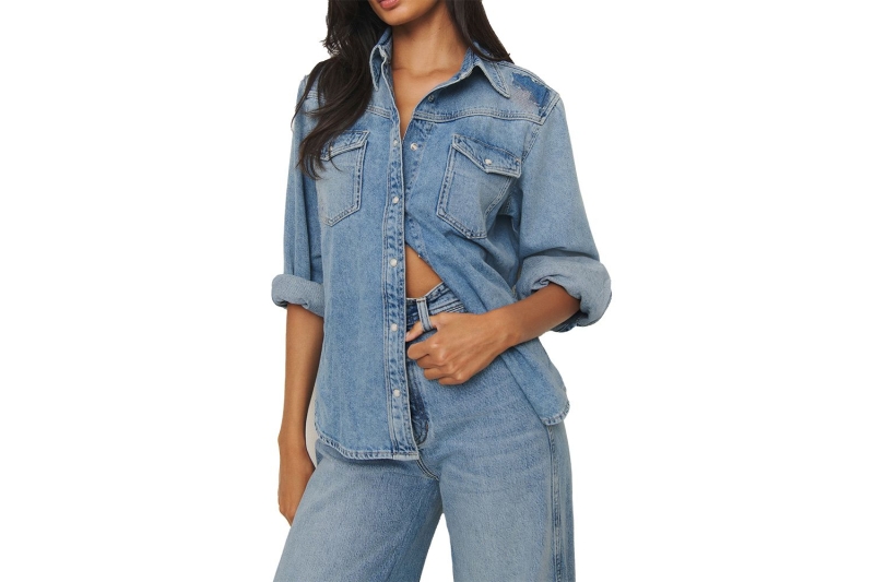 Meghan Markle wore several versions of a classic denim button-down shirt in her upcoming Netflix show, proving that the closet staple is both practical and polished. Shop seven lookalikes of her denim blouse, starting at $29.