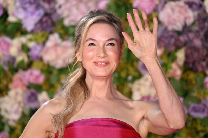 Renée Zellweger celebrated the world premiere of 'Bridget Jones: Mad About the Boy' in a hot pink gown from the Pierre Balmain archive. See photos of the full look, here.