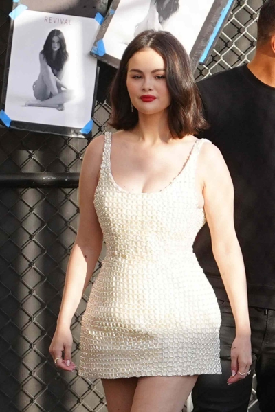 Selena Gomez is in her bridal era and her latest bedazzled white micro-minidress proves it.