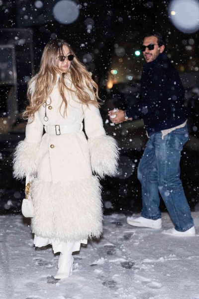 Sydney Sweeney embraced date night during a New York City blizzard by throwing snowballs while dressed in head-to-toe winter white on January 19. See her cozy outfit, here.