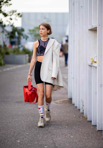 Celebrities like Bella Hadid and Kristen Stewart are boosting their outfits with crew socks. Check out our favorite way to wear the crew socks trend, here.