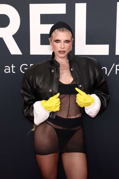 Julia Fox wore a G-string thong and kitchen gloves on the red carpet at the 2025 Grammy. See the polarizing look here.